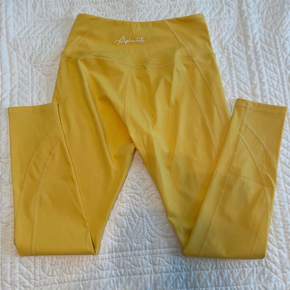 Light yellow pulse surge alphalete leggings